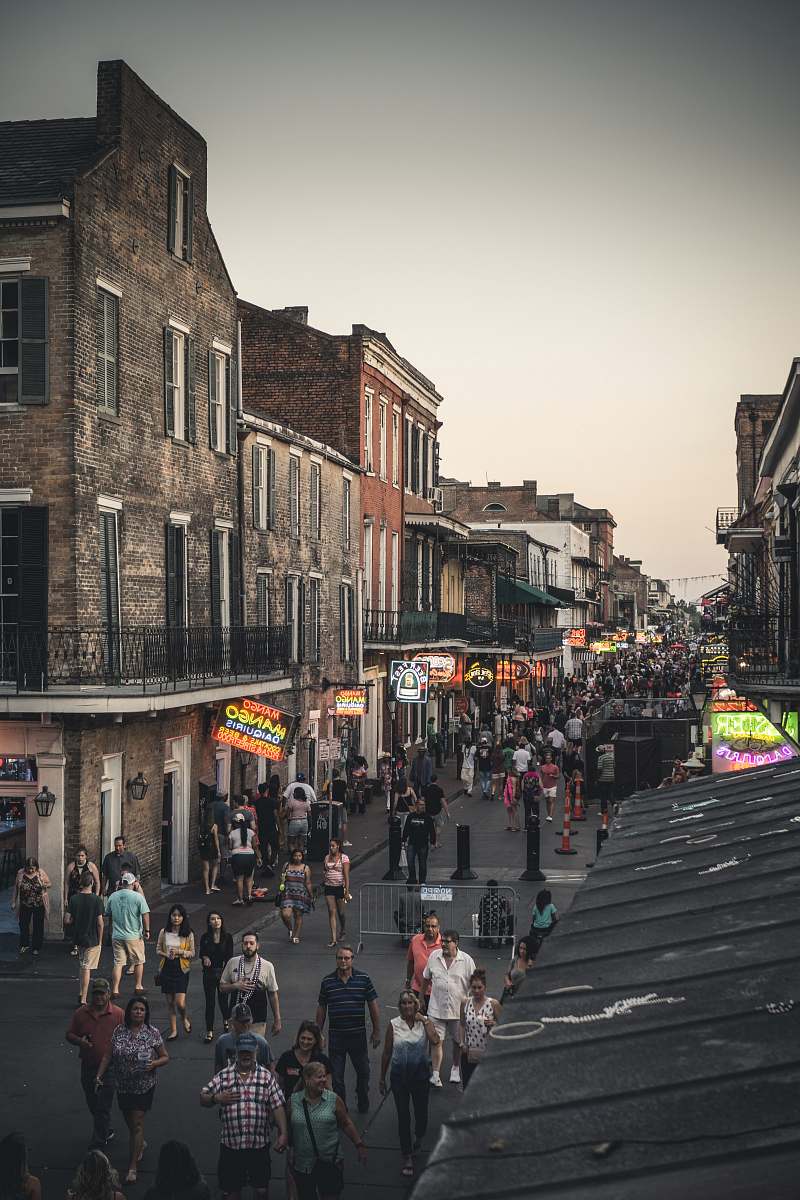 new orleans people walking on street during day time street
